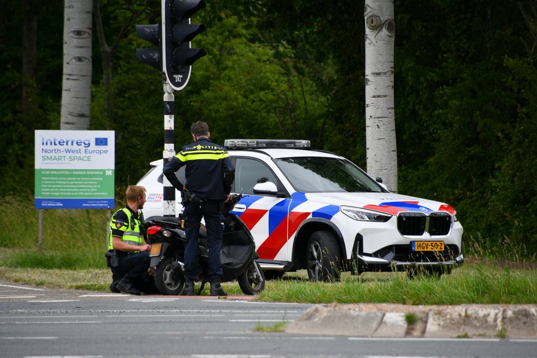 Blikschade na aanrijding scooter en auto Middelburg